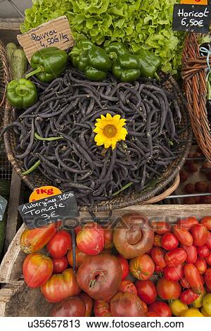 "Traditional French market stall with vegetables on display, Issigeac, France" View Large Photo Image Stock Image - "Traditional French market stall with vegetables on display, Issigeac, France". Fotosearch