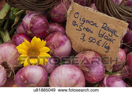 "Traditional French market stall with onions on display, Issigeac, France" View Large Photo Image Stock Photo - "Traditional French market stall with onions on display, Issigeac, France". Fotosearch
