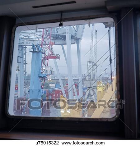 Stock Image - View from the bridge of container ship in port. Fotosearch