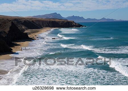 "View of coastline cliffs and sea, Fuerteventura, Spain" View Large Photo Image Stock Photo - "View of coastline cliffs and sea, Fuerteventura, Spain". Fotosearch