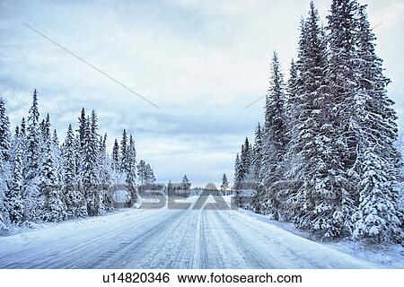 "View of empty snow covered highway, Hemavan, Sweden" View Large Photo Image Stock Photograph - "View of empty snow covered highway, Hemavan, Sweden". Fotosearch