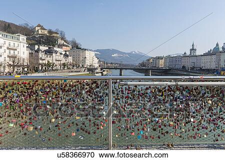 Stock Image - "View of love locks on waterfront fence, Salzburg, Austria". Fotosearch