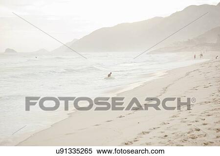 Stock Photography - "View of misty beach, Rio De Janeiro, Brazil". Fotosearch