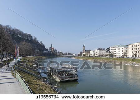 Picture - "View of Salzach river and waterfront, Salzburg, Austria". Fotosearch