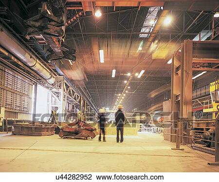 View of workers in steel mill View Large Photo Image Stock Image - View of workers in steel mill. Fotosearch