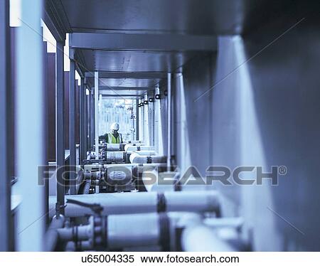 Worker at recycling plant View Large Photo Image Stock Photography - Worker at recycling plant. Fotosearch
