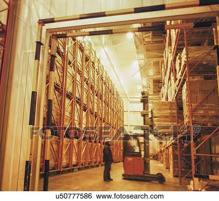 Workers in deep freeze food store View Large Photo Image Stock Photograph - Workers in deep freeze food store. Fotosearch
