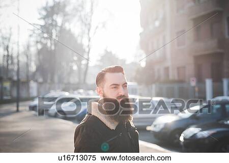 Young bearded man on street View Large Photo Image Stock Photography - Young bearded man on street. Fotosearch