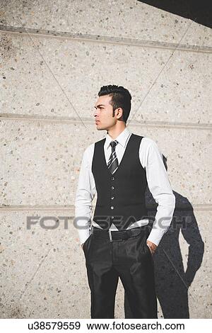 "Young businessman in the street, Milan, Italy" View Large Photo Image Stock Photo - "Young businessman in the street, Milan, Italy". Fotosearch