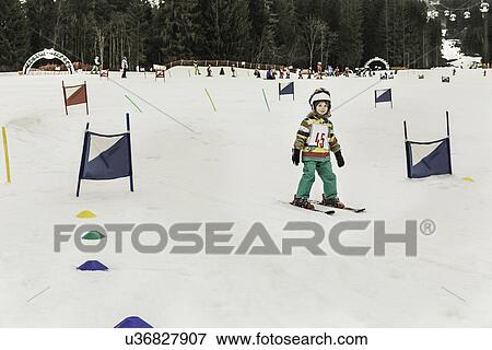 Young girl skiing through flags View Large Photo Image Stock Photo - Young girl skiing through flags. Fotosearch