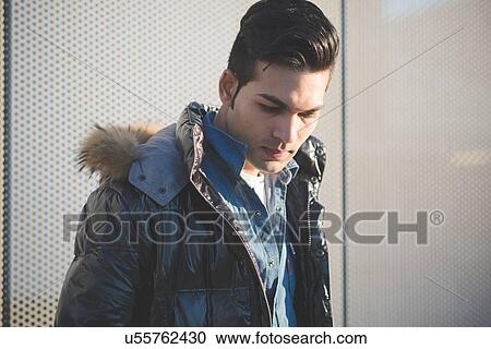 Young man wearing jacket View Large Photo Image Stock Image - Young man wearing jacket. Fotosearch