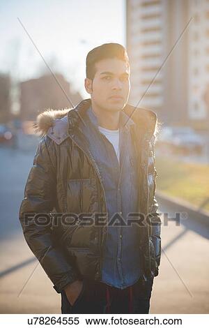 Stock Photography - Young man wearing jacket. Fotosearch