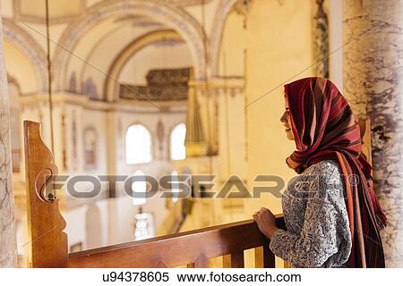 "Young woman in mosque, wearing headscarf, Istanbul, Turkey" View Large Photo Image Stock Photography - "Young woman in mosque, wearing headscarf, Istanbul, Turkey". Fotosearch