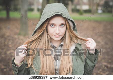 Young woman in park View Large Photo Image Stock Photo - Young woman in park. Fotosearch