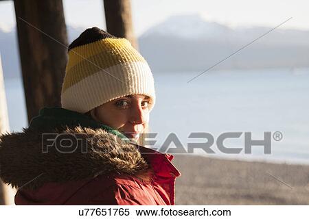 Young woman wearing knit hat View Large Photo Image Stock Photography - Young woman wearing knit hat. Fotosearch