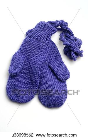 Stock Image - Baby gloves on white background. Fotosearch