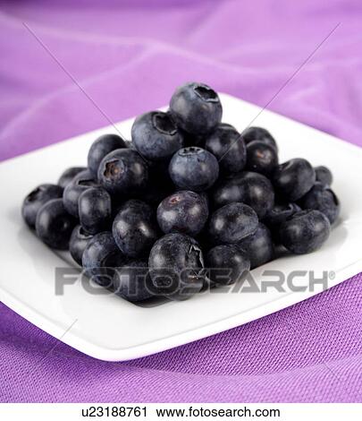 Blueberries on white plate - close up View Large Photo Image Stock Image - Blueberries on white plate - close up. Fotosearch