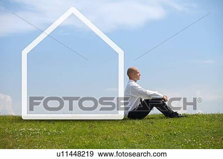 Businessman contemplating in park View Large Photo Image Stock Photo - Businessman contemplating in park. Fotosearch