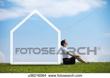 Businesswoman contemplating in park View Large Photo Image Picture - Businesswoman contemplating in park. Fotosearch