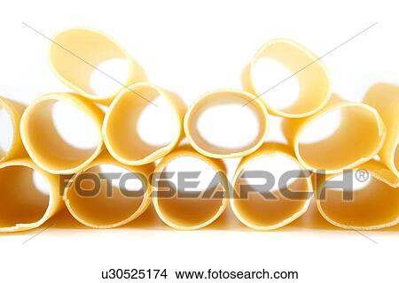 Picture - Cannelloni raw pasta on white background. Fotosearch