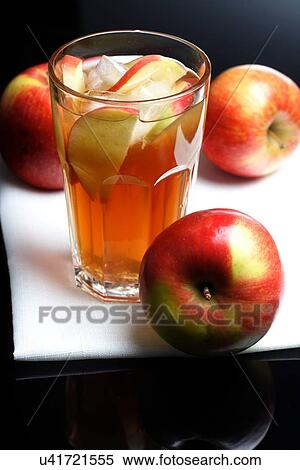 Stock Photography - Close up of apple juice. Fotosearch