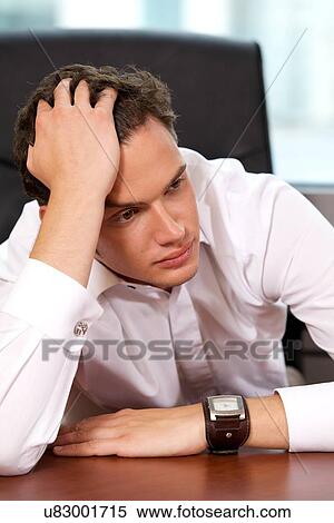 Close-up of businessman with head in hands View Large Photo Image Stock Photography - Close-up of businessman with head in hands. Fotosearch