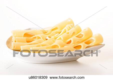 Stock Photo - Close - up of cheese on plate. Fotosearch