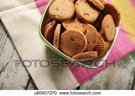 Stock Image - Close-up of cookies in bowl. Fotosearch