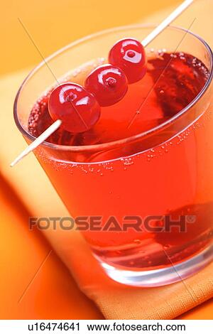 Stock Image - Close up of drink - studio shot. Fotosearch