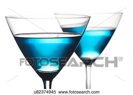 Stock Photography - Close up of drinks in martini glasses. Fotosearch