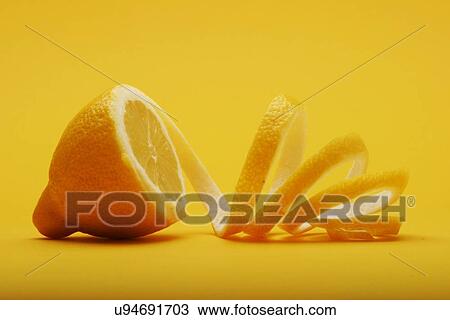 Stock Image - Close up of lemon on white background. Fotosearch
