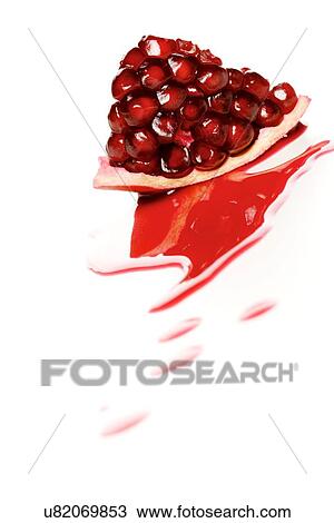 Close-up of pamebranate on white background View Large Photo Image Stock Image - Close-up of pamebranate on white background. Fotosearch