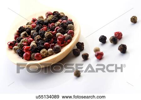 Stock Photo - Close up of pepper grains. Fotosearch