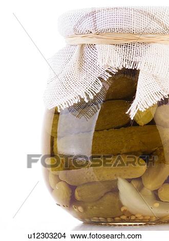 Close up of pickled cucumbers in jar View Large Photo Image Picture - Close up of pickled cucumbers in jar. Fotosearch