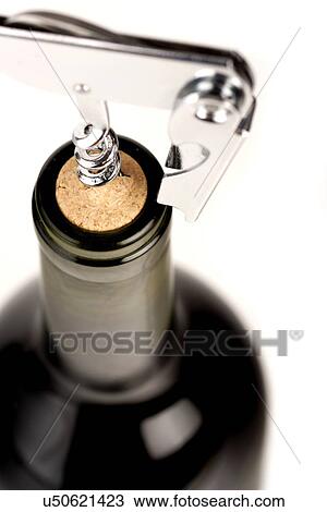 Stock Image - Close-up of red whine bottle. Fotosearch