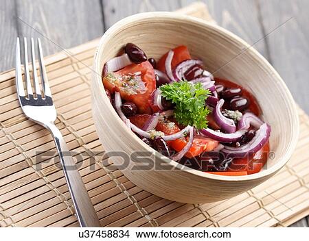 Picture - Close up of salad in bowl. Fotosearch