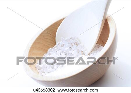 Close up of salt grains on spoon View Large Photo Image Stock Image - Close up of salt grains on spoon. Fotosearch