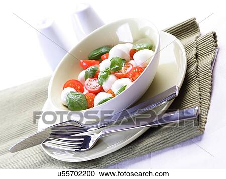 Close - up of sliced tomatoes with mozarella View Large Photo Image Stock Image - Close - up of sliced tomatoes with mozarella. Fotosearch