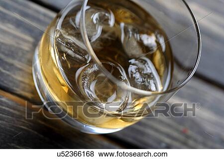 Stock Photo - Close-up of whisky glass. Fotosearch