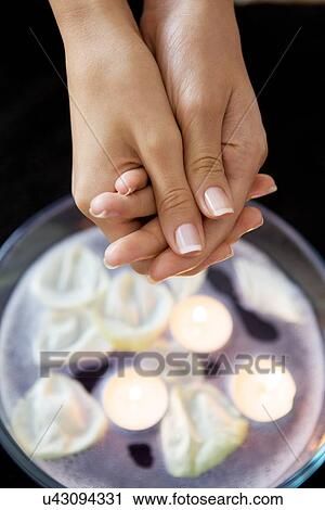 Close-up of woman receiving heat therapy on hand View Large Photo Image Stock Image - Close-up of woman receiving heat therapy on hand. Fotosearch