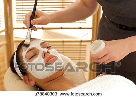 Close-up of young woman receiving beauty treatment in spa View Large Photo Image Stock Image - Close-up of young woman receiving beauty treatment in spa. Fotosearch