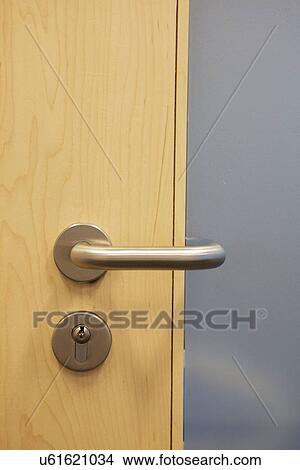 Closed door with doorknob View Large Photo Image Picture - Closed door with doorknob. Fotosearch