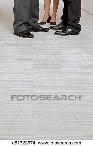 Picture - Closeup of business people shoes with copyspace. Fotosearch