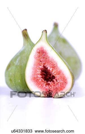 Stock Image - Figs on white background - studio shot. Fotosearch