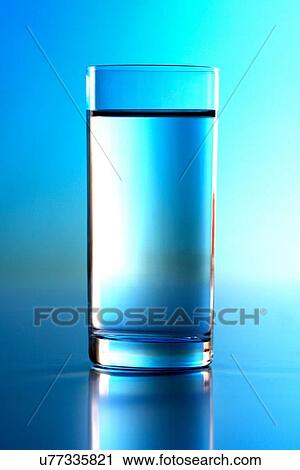 Stock Image - Glass of water - studio shot. Fotosearch