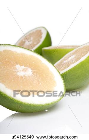 Green grapefruits on white background View Large Photo Image Stock Photo - Green grapefruits on white background. Fotosearch