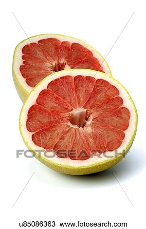 Stock Image - Halved grapefruit on white background. Fotosearch