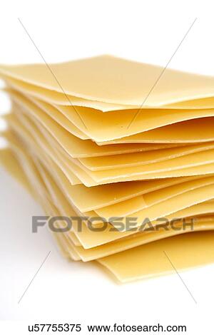 Stock Photography - Lasagne raw pasta on white background. Fotosearch