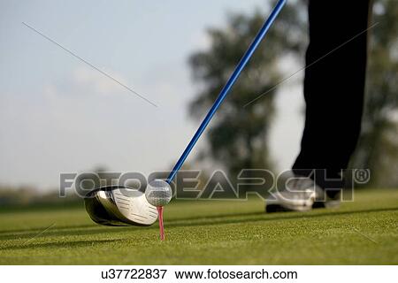 Person playing golf, low section View Large Photo Image Stock Photo - Person playing golf, low section. Fotosearch