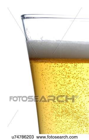 Stock Image - Pint of beer - studio shot. Fotosearch